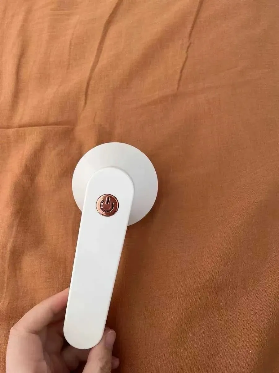 ئامێری لابردنی پشم بەخۆڕایی